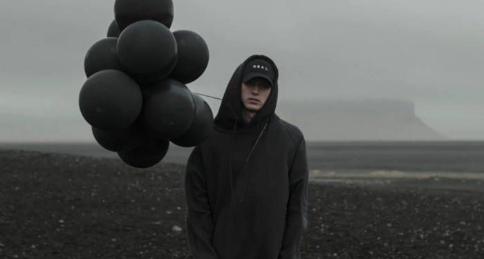 NF Breaks Silence and Gives Fans An Update